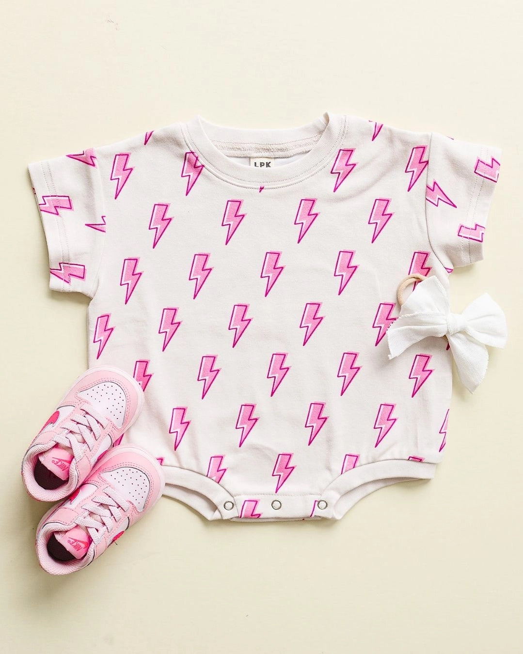 Pink Bolts Bubble Romper